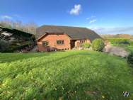 Main Photo of a 4 bedroom  Detached Bungalow for sale