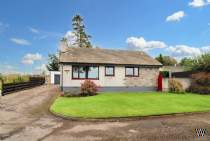 Main Photo of a 4 bedroom  Detached Bungalow for sale