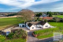 Main Photo of a 4 bedroom  Detached Bungalow for sale